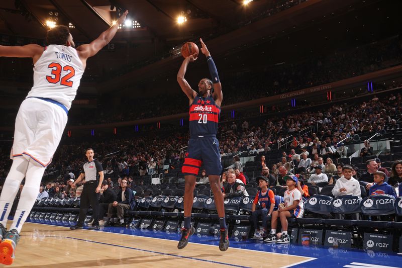 NEW YORK, NY - NOVEMBER 18: Alexandre Sarr #20 of the Washington Wizards shoots a three point basket during the game against the New York Knicks on November 18, 2024 at Madison Square Garden in New York City, New York.  NOTE TO USER: User expressly acknowledges and agrees that, by downloading and or using this photograph, User is consenting to the terms and conditions of the Getty Images License Agreement. Mandatory Copyright Notice: Copyright 2024 NBAE  (Photo by Nathaniel S. Butler/NBAE via Getty Images)