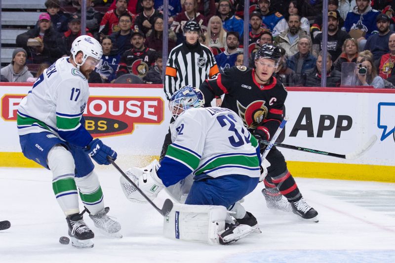 Jan 13, 2026; Ottawa, Ontario, CAN; Vancouver Canucks goalie Kevin Lankinen (32) makes a save on Ottawa Senators left wing Brady Tkachuk (7) in the first period at the Canadian Tire Centre. Mandatory Credit: Marc DesRosiers-IMAGN Images