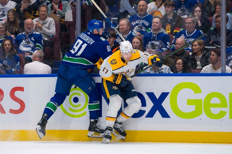 Apr 21, 2024; Vancouver, British Columbia, CAN; Vancouver Canucks defenseman Nikita Zadorov (91) checks Nashville Predators forward Mark Jankowski (17) in the first period in game one of the first round of the 2024 Stanley Cup Playoffs at Rogers Arena. Mandatory Credit: Bob Frid-USA TODAY Sports