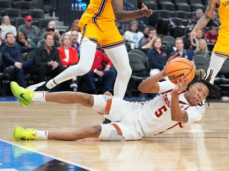 Mar 9, 2023; Las Vegas, NV, USA; USC Trojans guard Boogie Ellis (5) recovers a loose ball while playing against the Arizona State Sun Devils during the second half at T-Mobile Arena. Mandatory Credit: Stephen R. Sylvanie-USA TODAY Sports