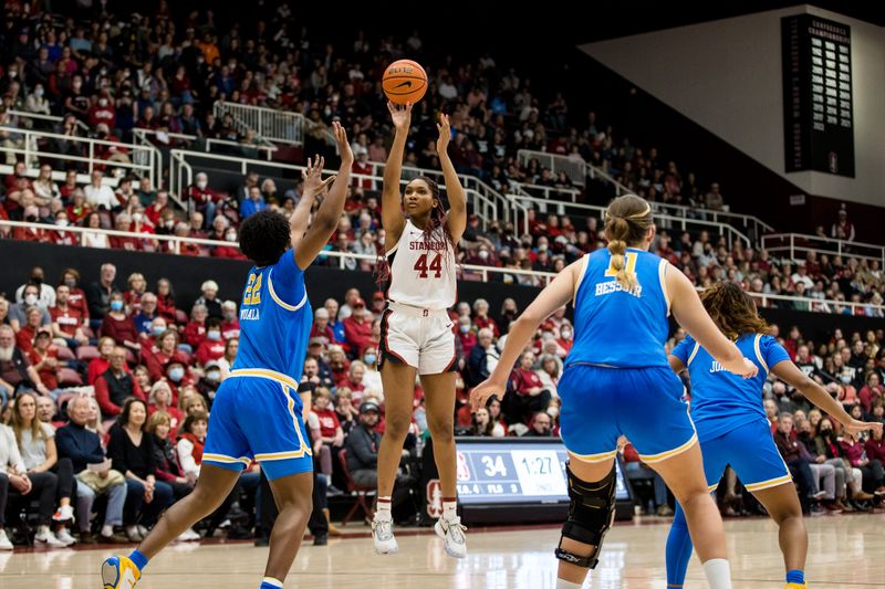 Feb 20, 2023; Stanford, California, USA;  Stanford Cardinal forward Kiki Iriafen (44) shoots over UCLA Bruins forward Christeen Iwuala (22) during the first half at Maples Pavilion. Mandatory Credit: John Hefti-USA TODAY Sports