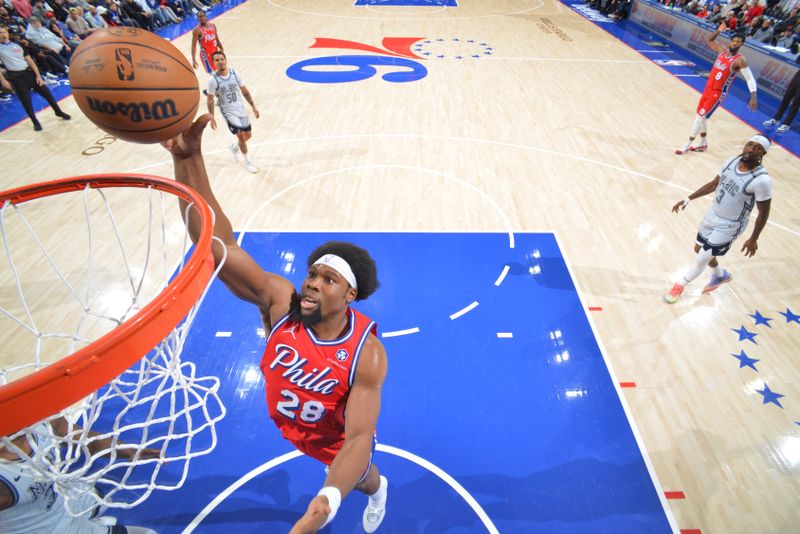 PHILADELPHIA, PA - DECEMBER 6: Guerschon Yabusele #28 of the Philadelphia 76ers drives to the basket during the game against the Orlando Magic on December 6, 2024 at the Wells Fargo Center in Philadelphia, Pennsylvania NOTE TO USER: User expressly acknowledges and agrees that, by downloading and/or using this Photograph, user is consenting to the terms and conditions of the Getty Images License Agreement. Mandatory Copyright Notice: Copyright 2024 NBAE (Photo by Jesse D. Garrabrant/NBAE via Getty Images)