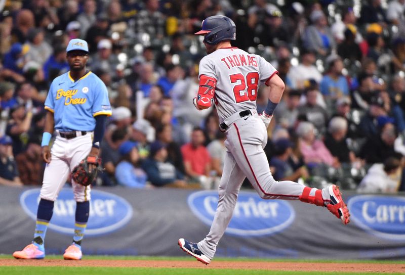 Sep 15, 2023; Milwaukee, Wisconsin, USA; Washington Nationals right fielder Lane Thomas (28) rounds the bases after hitting a home run agains the Milwaukee Brewers in the first inning at American Family Field. Mandatory Credit: Michael McLoone-USA TODAY Sports