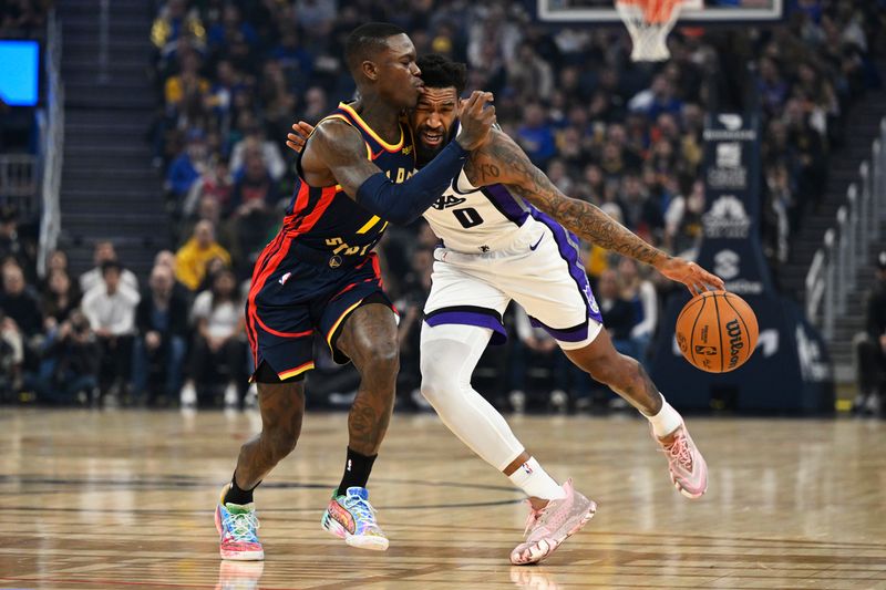 SAN FRANCISCO, CALIFORNIA - JANUARY 05: Malik Monk #0 of the Sacramento Kings dribbles against Dennis Schroder #71 of the Golden State Warriors in the first quarter at Chase Center on January 05, 2025 in San Francisco, California. NOTE TO USER: User expressly acknowledges and agrees that, by downloading and or using this photograph, User is consenting to the terms and conditions of the Getty Images License Agreement. (Photo by Eakin Howard/Getty Images)