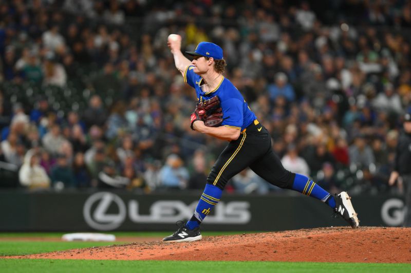 Sep 27, 2024; Seattle, Washington, USA; Seattle Mariners relief pitcher Troy Taylor (59) pitches to the Oakland Athletics during the ninth inning at T-Mobile Park. Mandatory Credit: Steven Bisig-Imagn Images