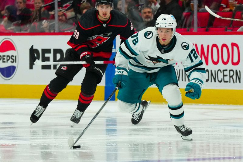 Oct 27, 2023; Raleigh, North Carolina, USA; San Jose Sharks center William Eklund (72) skates with the puck against the Carolina Hurricanes during the second period at PNC Arena. Mandatory Credit: James Guillory-USA TODAY Sports