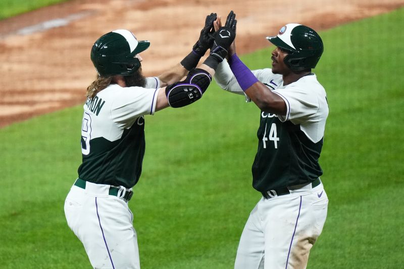 Aug 19, 2023; Denver, Colorado, USA; Colorado Rockies first baseman Elehuris Montero (44) congratulates designated hitter Charlie Blackmon (19) for his two run home run in the seventh inning against the Chicago White Sox at Coors Field. Mandatory Credit: Ron Chenoy-USA TODAY Sports