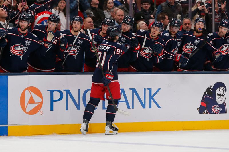 Dec 4, 2025; Columbus, Ohio, USA; Columbus Blue Jackets center Kent Johnson (91) celebrates his goal against the Detroit Red Wings during the second period at Nationwide Arena. Mandatory Credit: Russell LaBounty-Imagn Images