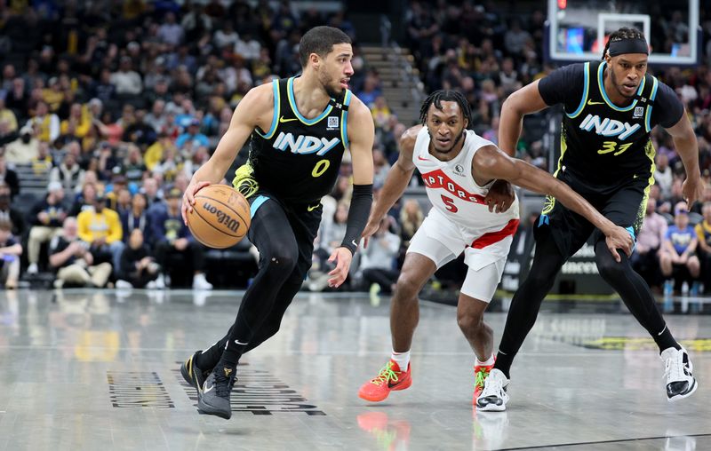 INDIANAPOLIS, INDIANA - FEBRUARY 26:   Tyrese Haliburton #0 of the Indiana Pacers dribbles the ball while against the Toronto Raptors at Gainbridge Fieldhouse on February 26, 2024 in Indianapolis, Indiana.    NOTE TO USER: User expressly acknowledges and agrees that, by downloading and or using this photograph, User is consenting to the terms and conditions of the Getty Images License Agreement.  (Photo by Andy Lyons/Getty Images)