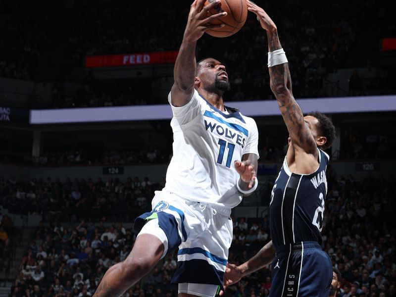 MINNEAPOLIS, MN -  OCTOBER 29: Naz Reid #11 of the Minnesota Timberwolves shoots the ball during the game against the Dallas Mavericks on October 29, 2024 at Target Center in Minneapolis, Minnesota. NOTE TO USER: User expressly acknowledges and agrees that, by downloading and or using this Photograph, user is consenting to the terms and conditions of the Getty Images License Agreement. Mandatory Copyright Notice: Copyright 2024 NBAE (Photo by David Sherman/NBAE via Getty Images)