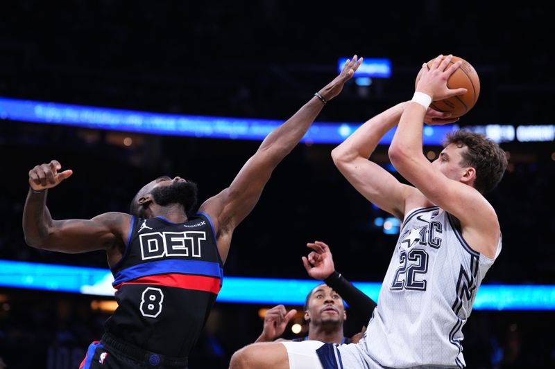 ORLANDO, FLORIDA - NOVEMBER 23: Franz Wagner #22 of the Orlando Magic goes up for a shot against Tim Hardaway Jr. #8 of the Detroit Pistons during the third quarter at Kia Center on November 23, 2024 in Orlando, Florida. NOTE TO USER: User expressly acknowledges and agrees that, by downloading and/or using this photograph, user is consenting to the terms and conditions of the Getty Images License Agreement. (Photo by Rich Storry/Getty Images)