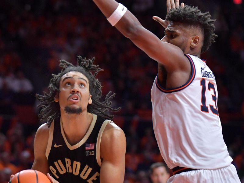 Mar 5, 2024; Champaign, Illinois, USA; Purdue Boilermakers forward Trey Kaufman-Renn (4) drives to the basket as Illinois Fighting Illini forward Quincy Guerrier (13) defends during the second half at State Farm Center. Mandatory Credit: Ron Johnson-USA TODAY Sports