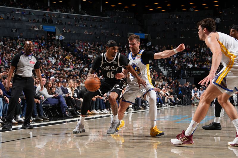 BROOKLYN, NY - MARCH 6: Keon Johnson #45 of the Brooklyn Nets handles the ball during the game against the Golden State Warriors on March 6, 2025 at Barclays Center in Brooklyn, New York. NOTE TO USER: User expressly acknowledges and agrees that, by downloading and or using this Photograph, user is consenting to the terms and conditions of the Getty Images License Agreement. Mandatory Copyright Notice: Copyright 2025 NBAE (Photo by Jesse D. Garrabrant/NBAE via Getty Images)