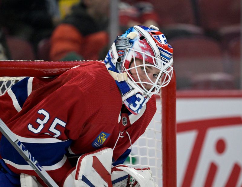 Feb 21, 2024; Montreal, Quebec, CAN; Montreal Canadiens goalie Sam Montembeault (35) during the second period of the game against the Buffalo Sabres at the Bell Centre. Mandatory Credit: Eric Bolte-USA TODAY Sports