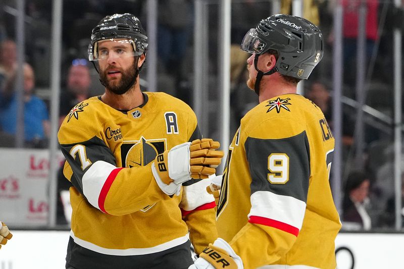 Sep 27, 2024; Las Vegas, Nevada, USA; Vegas Golden Knights defenseman Alex Pietrangelo (7) celebrates with Vegas Golden Knights center Jack Eichel (9) after scoring a goal against the Utah Hockey Club during the second period at T-Mobile Arena. Mandatory Credit: Stephen R. Sylvanie-Imagn Images