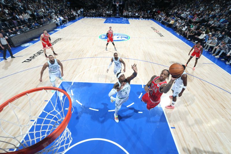 MINNEAPOLIS, MN -  MARCH 31: DeMar DeRozan #11 of the Chicago Bulls drives to the basket during the game against the Minnesota Timberwolves on March 31, 2024 at Target Center in Minneapolis, Minnesota. NOTE TO USER: User expressly acknowledges and agrees that, by downloading and or using this Photograph, user is consenting to the terms and conditions of the Getty Images License Agreement. Mandatory Copyright Notice: Copyright 2024 NBAE (Photo by David Sherman/NBAE via Getty Images)