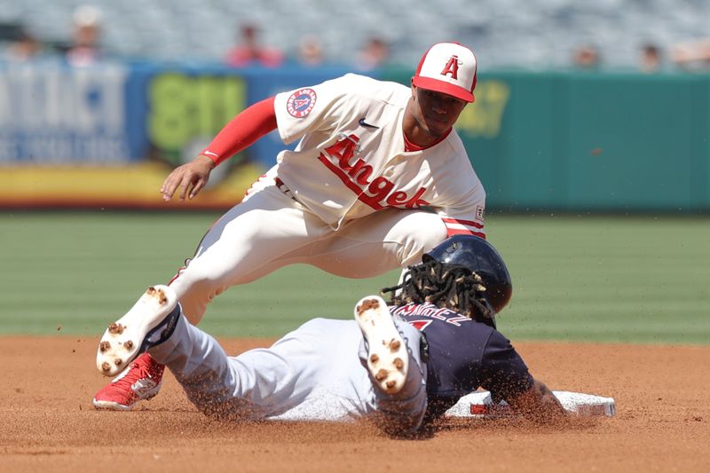 Sep 10, 2023; Anaheim, California, USA; Los Angeles Angels second baseman Kyren Paris (19) tags Cleveland Guardians third baseman Jose Ramirez (11) out during the first inning of a baseball game at Angel Stadium. Mandatory Credit: Jessica Alcheh-USA TODAY Sports