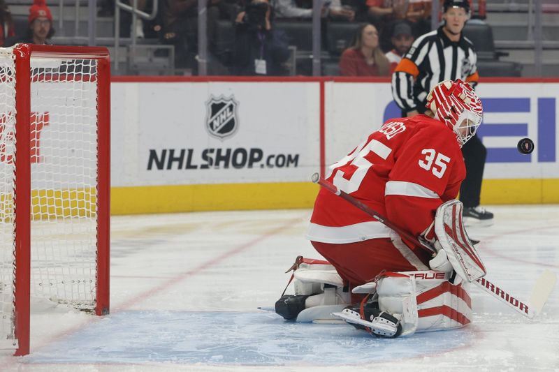 Nov 10, 2022; Detroit, Michigan, USA; Detroit Red Wings goaltender Ville Husso (35) makes a save in the first period against the New York Rangers at Little Caesars Arena. Mandatory Credit: Rick Osentoski-USA TODAY Sports