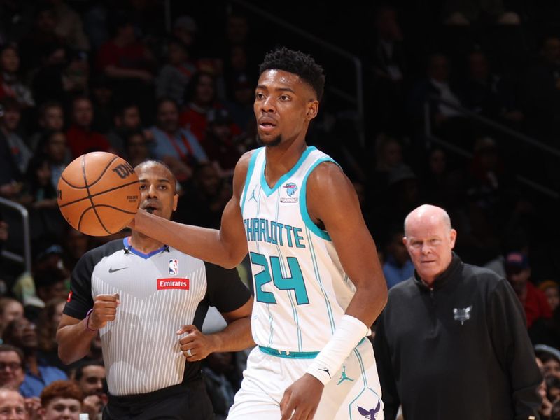 WASHINGTON, DC -? MARCH 8:  Brandon Miller #24 of the Charlotte Hornets handles the ball during the game  on March 8, 2024 at Capital One Arena in Washington, DC. NOTE TO USER: User expressly acknowledges and agrees that, by downloading and or using this Photograph, user is consenting to the terms and conditions of the Getty Images License Agreement. Mandatory Copyright Notice: Copyright 2024 NBAE (Photo by Stephen Gosling/NBAE via Getty Images)