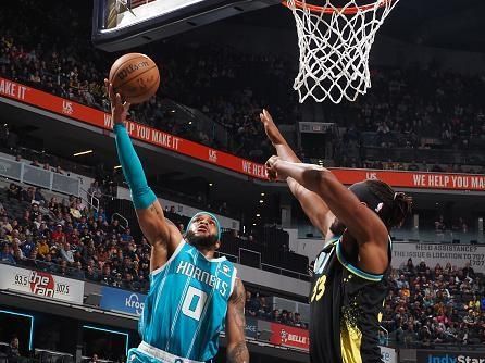 INDIANAPOLIS, IN - DECEMBER 20: Miles Bridges #0 of the Charlotte Hornets shoots the ball during the game against the Indiana Pacers on December 20, 2023 at Gainbridge Fieldhouse in Indianapolis, Indiana. NOTE TO USER: User expressly acknowledges and agrees that, by downloading and or using this Photograph, user is consenting to the terms and conditions of the Getty Images License Agreement. Mandatory Copyright Notice: Copyright 2023 NBAE (Photo by Ron Hoskins/NBAE via Getty Images)