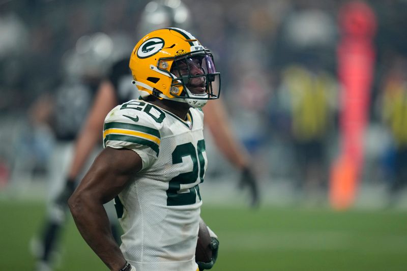 Green Bay Packers safety Rudy Ford (20) plays against the Las Vegas Raiders during an NFL football game, Monday, Oct. 9, 2023, in Las Vegas. (AP Photo/John Locher)