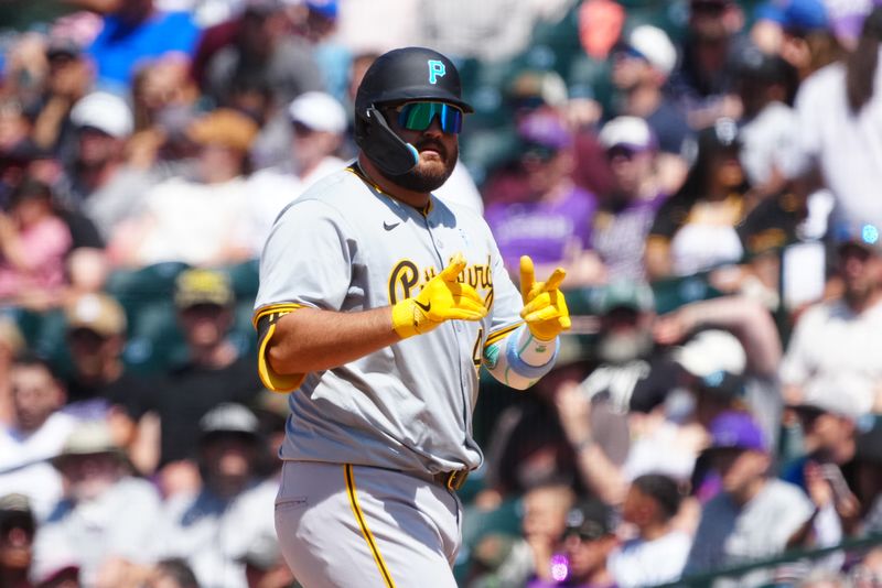 Jun 16, 2024; Denver, Colorado, USA; Pittsburgh Pirates first base Rowdy Tellez (44) celebrates his run single in the seventh inning against the Colorado Rockies at Coors Field. Mandatory Credit: Ron Chenoy-USA TODAY Sports