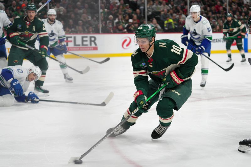 Feb 19, 2024; Saint Paul, Minnesota, USA; Minnesota Wild center Vinni Lettieri (10) skates in the offensive zone against the Vancouver Canucks in the second period at Xcel Energy Center. Mandatory Credit: Matt Blewett-USA TODAY Sports