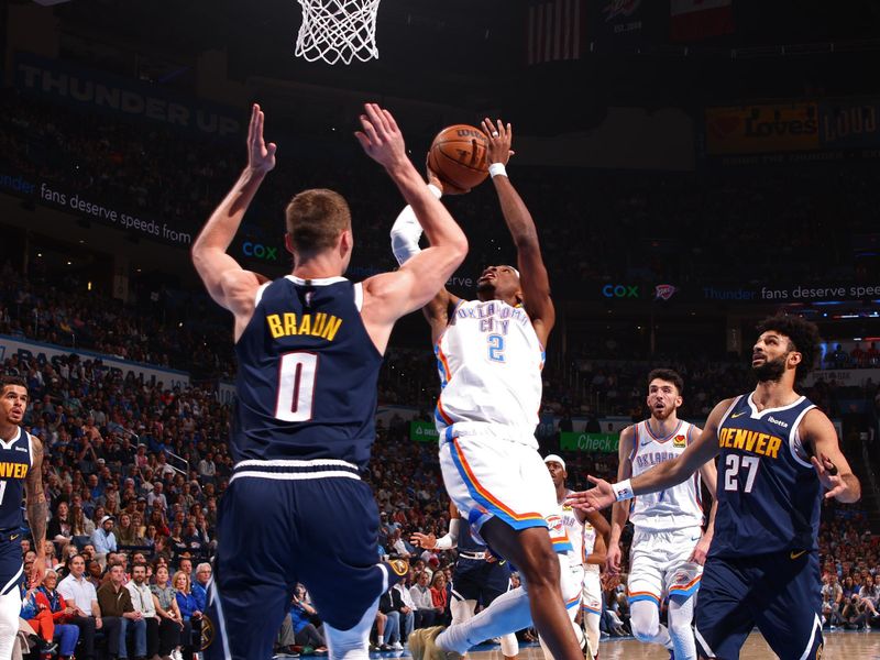 OKLAHOMA CITY, OK - MARCH 10: Shai Gilgeous-Alexander #2 of the Oklahoma City Thunder drives to the basket during the game against the Denver Nuggets on March 10, 2025 at Paycom Center in Oklahoma City, Oklahoma. NOTE TO USER: User expressly acknowledges and agrees that, by downloading and or using this photograph, User is consenting to the terms and conditions of the Getty Images License Agreement. Mandatory Copyright Notice: Copyright 2025 NBAE(Photo by Zach Beeker/NBAE via Getty Images)