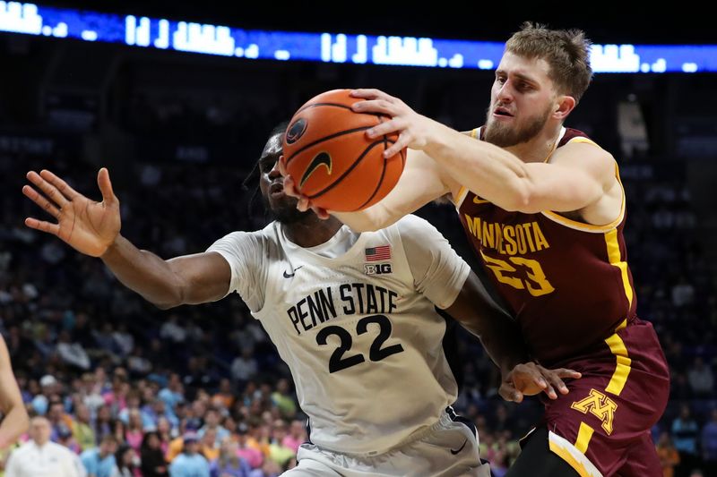 Jan 27, 2024; University Park, Pennsylvania, USA; Minnesota Golden Gophers forward Parker Fox (23) reaches for the loose ball as Penn State Nittany Lions forward Qudus Wahab (22) defends during the second half at Bryce Jordan Center. Minnesota defeated Penn State 83-74. Mandatory Credit: Matthew O'Haren-USA TODAY Sports