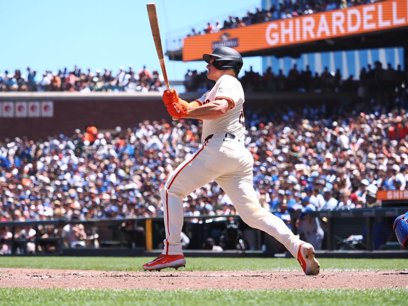 Jun 30, 2024; San Francisco, California, USA; San Francisco Giants third baseman Matt Chapman (26) hits a two-run home run against the Los Angeles Dodgers during the fourth inning at Oracle Park. Mandatory Credit: Kelley L Cox-USA TODAY Sports