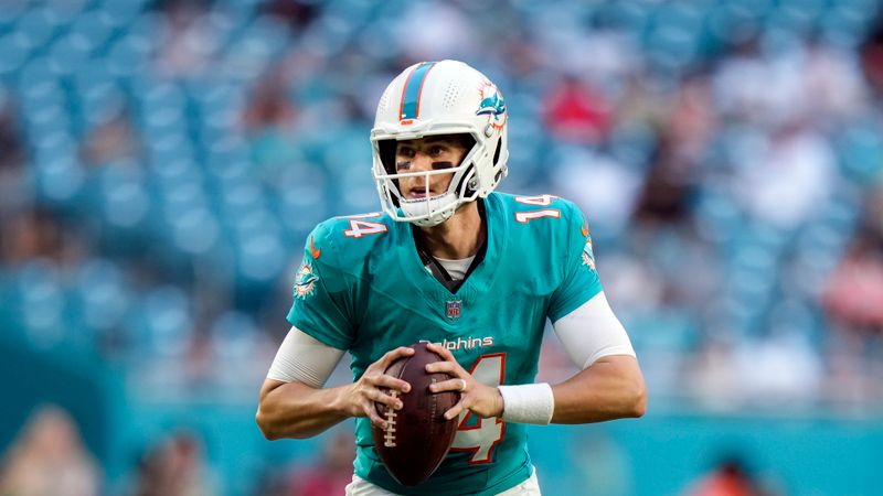 Miami Dolphins quarterback Mike White (14) looks for an open receiver during the first half of a preseason NFL football game against the Atlanta Falcons, Friday, Aug. 11, 2023, in Miami Gardens, Fla. (AP Photo/Wilfredo Lee)