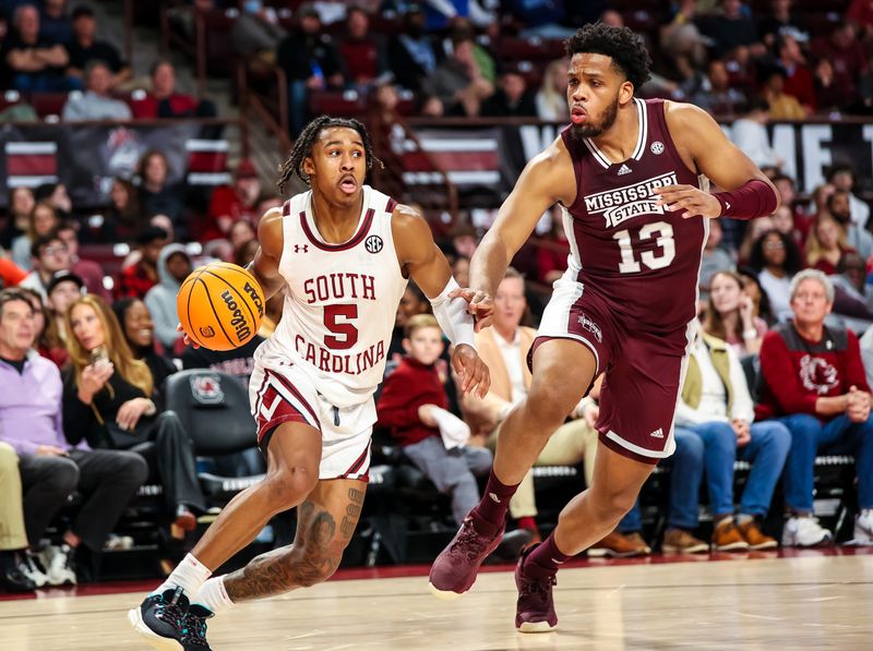 Jan 31, 2023; Columbia, South Carolina, USA; South Carolina Gamecocks guard Meechie Johnson (5) drives around Mississippi State Bulldogs forward Will McNair Jr. (13) in the first half at Colonial Life Arena. Mandatory Credit: Jeff Blake-USA TODAY Sports