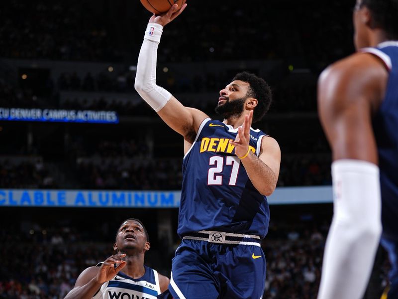 DENVER, CO - APRIL 10: Jamal Murray #27 of the Denver Nuggets drives to the basket during the game against the Minnesota Timberwolves on April 10, 2024 at the Ball Arena in Denver, Colorado. NOTE TO USER: User expressly acknowledges and agrees that, by downloading and/or using this Photograph, user is consenting to the terms and conditions of the Getty Images License Agreement. Mandatory Copyright Notice: Copyright 2024 NBAE (Photo by Garrett Ellwood/NBAE via Getty Images)