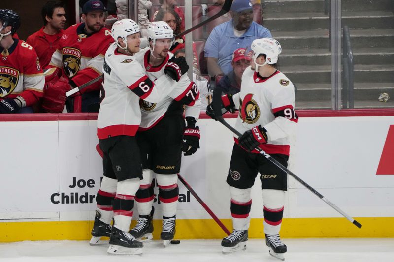 Feb 20, 2024; Sunrise, Florida, USA; Ottawa Senators defenseman Thomas Chabot (72) celebrates a goal against the Florida Panthers with teammates defenseman Jakob Chychrun (6) and right wing Vladimir Tarasenko (91) during the third period at Amerant Bank Arena. Mandatory Credit: Jim Rassol-USA TODAY Sports