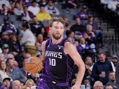 SACRAMENTO, CA - DECEMBER 23: Domantas Sabonis #10 of the Sacramento Kings drives to the basket during the game against the Minnesota Timberwolves on December 23, 2023 at Golden 1 Center in Sacramento, California. NOTE TO USER: User expressly acknowledges and agrees that, by downloading and or using this Photograph, user is consenting to the terms and conditions of the Getty Images License Agreement. Mandatory Copyright Notice: Copyright 2023 NBAE (Photo by Rocky Widner/NBAE via Getty Images)