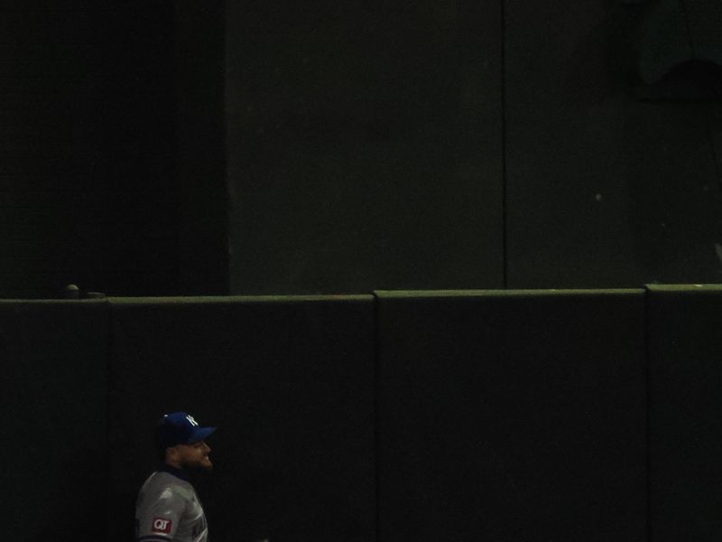 Jun 19, 2024; Oakland, California, USA; Kansas City Royals center fielder Kyle Isbel (28) at the wall as the ball goes over the wall for an Oakland Athletics home run during the eighth inning at Oakland-Alameda County Coliseum. Mandatory Credit: Kelley L Cox-USA TODAY Sports