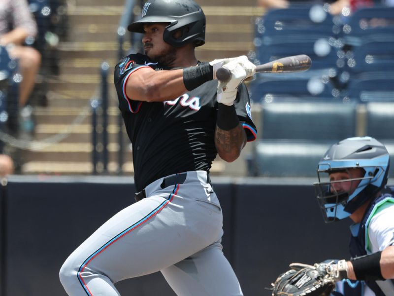 Jun 6, 2025; St. Petersburg, Florida, USA;  Miami Marlins outfielder Dane Myers (54) doubles during the third inning against the Tampa Bay Rays at George M. Steinbrenner Field. Mandatory Credit: Kim Klement Neitzel-Imagn Images