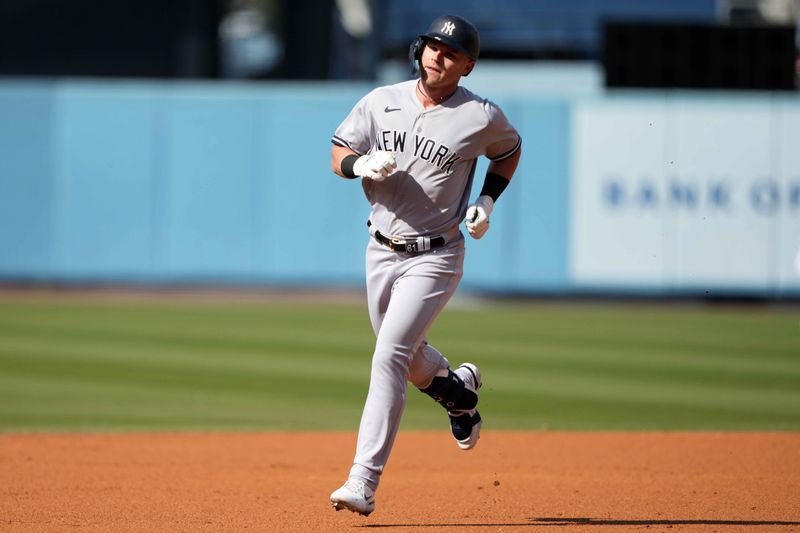 Jun 3, 2023; Los Angeles, California, USA; New York Yankees left fielder Jake Bauers (61) rounds the bases after hitting a two-run home run in the second inning against the Los Angeles Dodgers at Dodger Stadium. Mandatory Credit: Kirby Lee-USA TODAY Sports