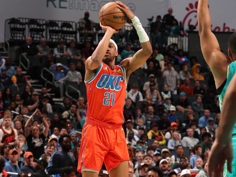 CHARLOTTE, NC - APRIL 7: Aaron Wiggins #21 of the Oklahoma City Thunder shoots the ball during the game against the Charlotte Hornets on April 7, 2024 at Spectrum Center in Charlotte, North Carolina. NOTE TO USER: User expressly acknowledges and agrees that, by downloading and or using this photograph, User is consenting to the terms and conditions of the Getty Images License Agreement. Mandatory Copyright Notice: Copyright 2024 NBAE (Photo by Kent Smith/NBAE via Getty Images)