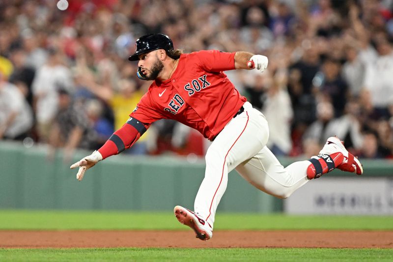 Jul 26, 2024; Boston, Massachusetts, USA; Boston Red Sox outfielder Wilyer Abreu (52) dives into second base after hitting a RBI double against the New York Yankees during the eighth inning at Fenway Park. Mandatory Credit: Brian Fluharty-USA TODAY Sports