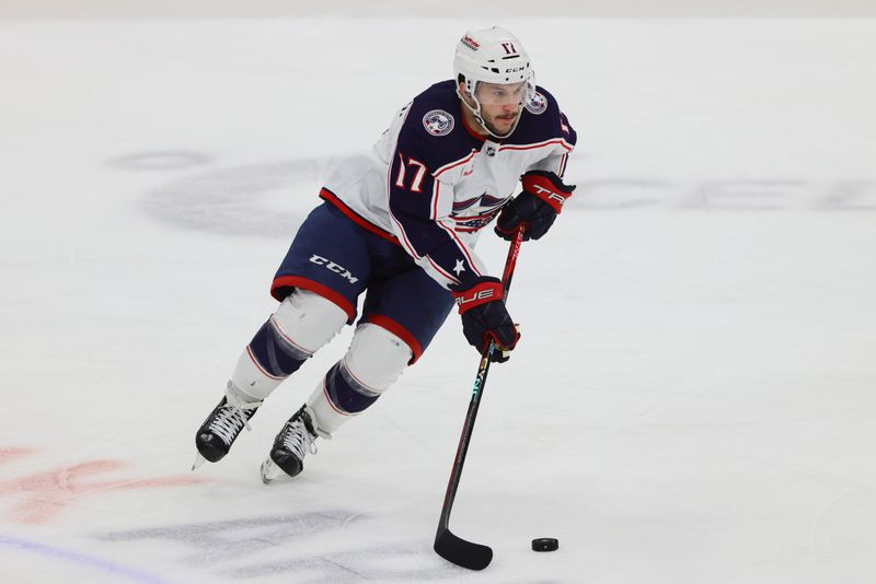 Apr 11, 2024; Sunrise, Florida, USA; Columbus Blue Jackets right wing Justin Danforth (17) moves the puck against the Florida Panthers during the first period at Amerant Bank Arena. Mandatory Credit: Sam Navarro-USA TODAY Sports