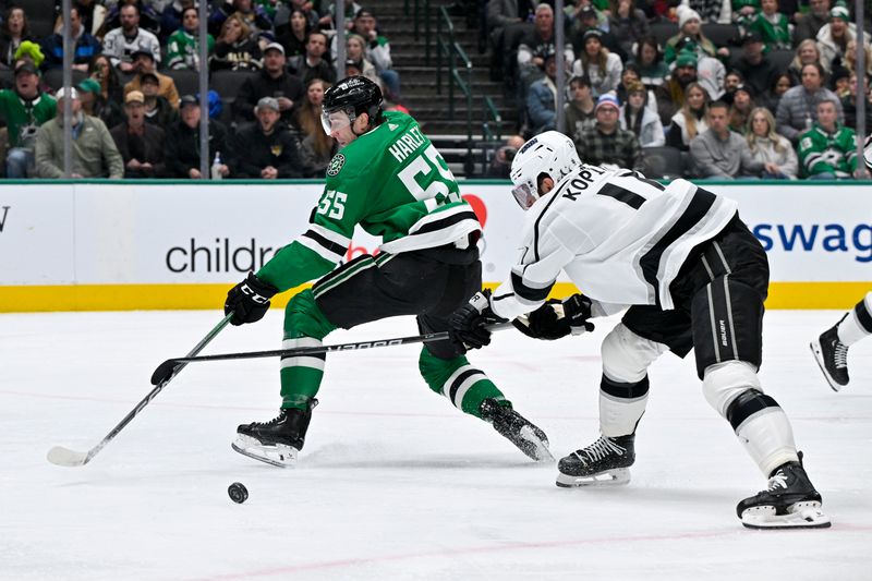 Jan 16, 2024; Dallas, Texas, USA; Los Angeles Kings center Anze Kopitar (11) lifts the stick of Dallas Stars defenseman Thomas Harley (55) as he stops him on a breakaway during the second period at the American Airlines Center. Mandatory Credit: Jerome Miron-USA TODAY Sports