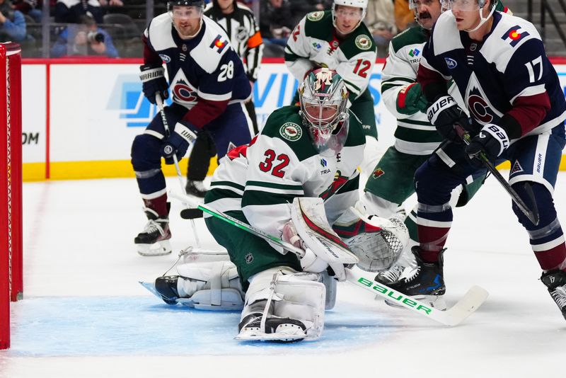 Feb 28, 2025; Denver, Colorado, USA; Minnesota Wild goaltender Filip Gustavsson (32) defends his net in the second period against the Colorado Avalanche at Ball Arena. Mandatory Credit: Ron Chenoy-Imagn Images