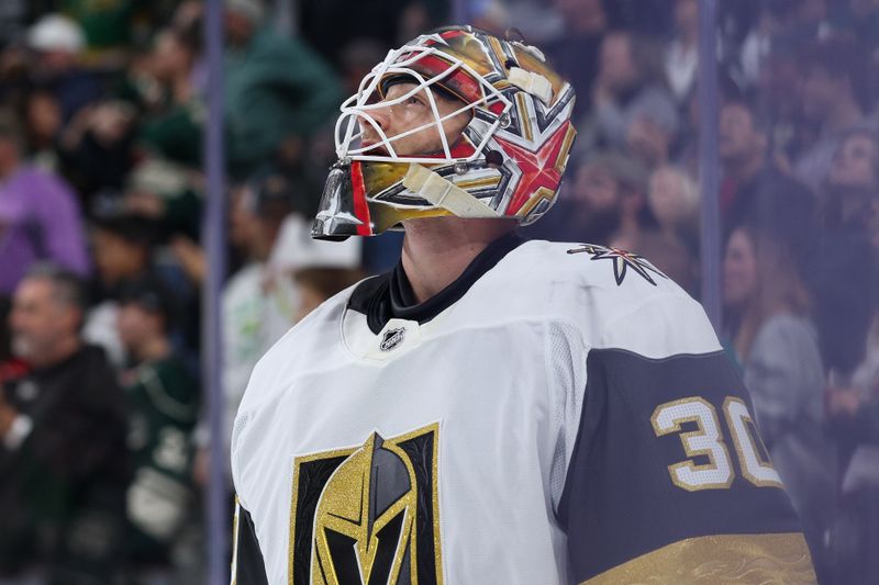 Nov 16, 2025; Saint Paul, Minnesota, USA; Vegas Golden Knights goaltender Carl Lindbom (30) looks on during the second period against the Minnesota Wild at Grand Casino Arena. Mandatory Credit: Matt Krohn-Imagn Images