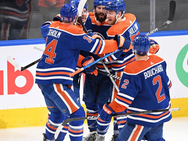 June 21, 2024; Edmonton, Alberta, CAN; Edmonton Oilers center Adam Henrique (19) celebrates with teammates after scoring a goal in the second period against the Florida Panthers in game six of the 2024 Stanley Cup Final at Rogers Place. Mandatory Credit: Walter Tychnowicz-USA TODAY Sports