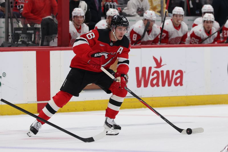 Mar 8, 2026; Newark, New Jersey, USA;  New Jersey Devils center Jack Hughes (86) controls the puck against the Detroit Red Wings during the second period at Prudential Center. Mandatory Credit: Thomas Salus-Imagn Images