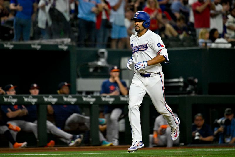 Apr 5, 2024; Arlington, Texas, USA; Texas Rangers second base Marcus Semien (2) rounds the bases after he hits a three run home run against the Houston Astros during the sixth inning at Globe Life Field. Mandatory Credit: Jerome Miron-USA TODAY Sports