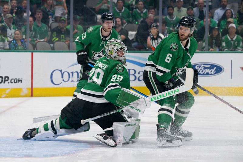 May 15, 2023; Dallas, Texas, USA; Dallas Stars goaltender Jake Oettinger (29) and defenseman Esa Lindell (23) and defenseman Colin Miller (6) face the Seattle Kraken attack in the Stars zone during the first period in game seven of the second round of the 2023 Stanley Cup Playoffs at the American Airlines Center. Mandatory Credit: Jerome Miron-USA TODAY Sports