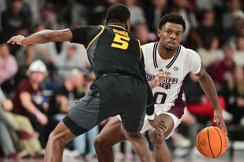 Feb 4, 2023; Starkville, Mississippi, USA; Mississippi State Bulldogs guard Dashawn Davis (10) brings the ball up court against Missouri Tigers guard D'Moi Hodge (5) during the second half at Humphrey Coliseum. Mandatory Credit: Matt Bush-USA TODAY Sports