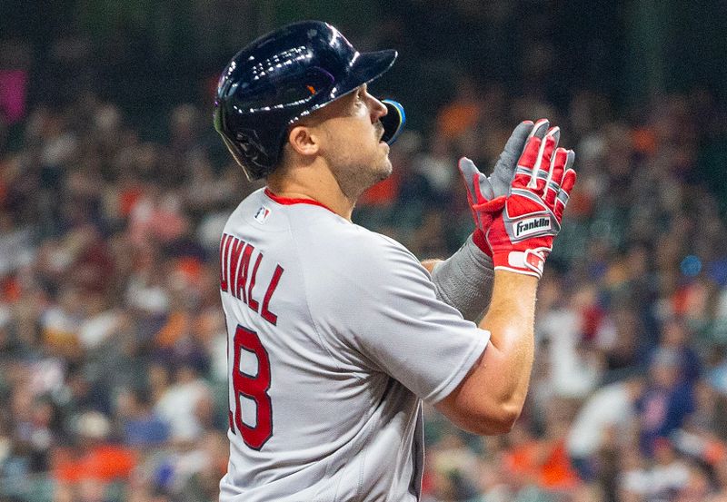 Aug 21, 2023; Houston, Texas, USA; Boston Red Sox center fielder Adam Duvall (18) reacts to his three run home run against the Houston Astros in the first inning at Minute Maid Park. Mandatory Credit: Thomas Shea-USA TODAY Sports